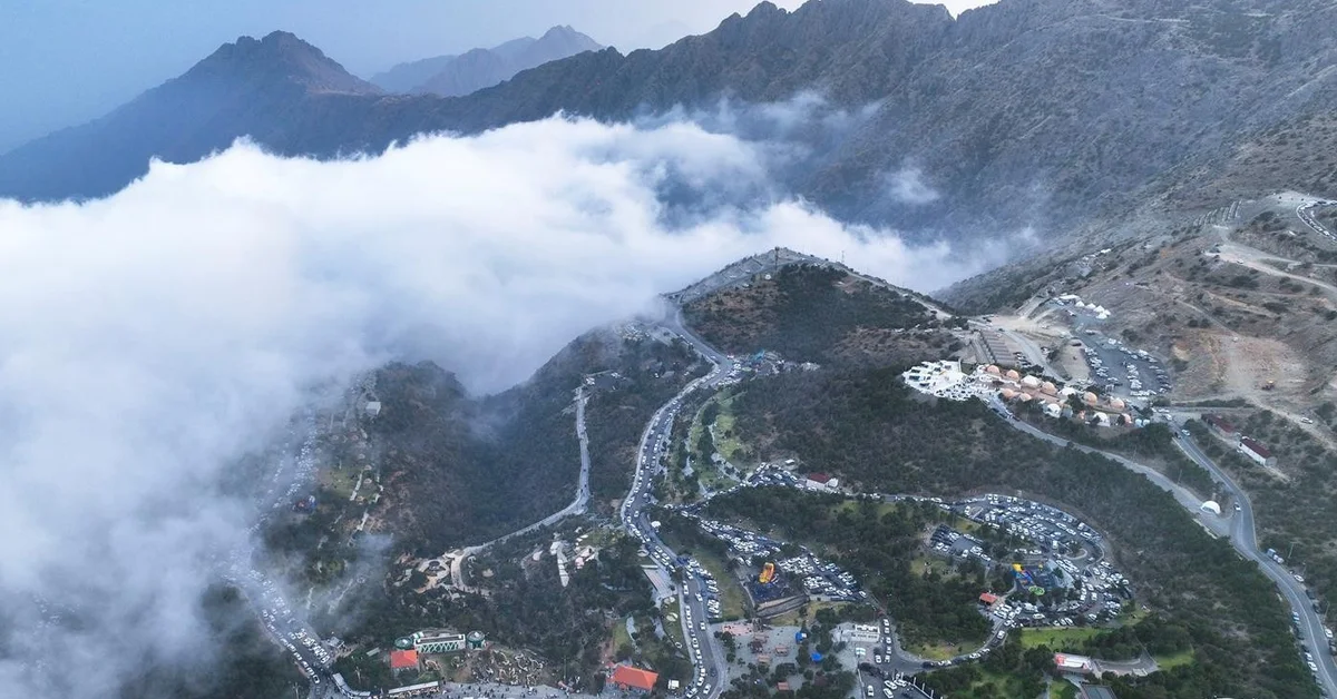 Thick Fog Transforms Al-Baha Foothills into Scenic Summer Retreat - Main Image