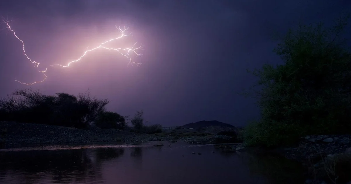 Lightning, Waterfalls Illuminate Al-Baha Region's Sky and Nature - Main Image